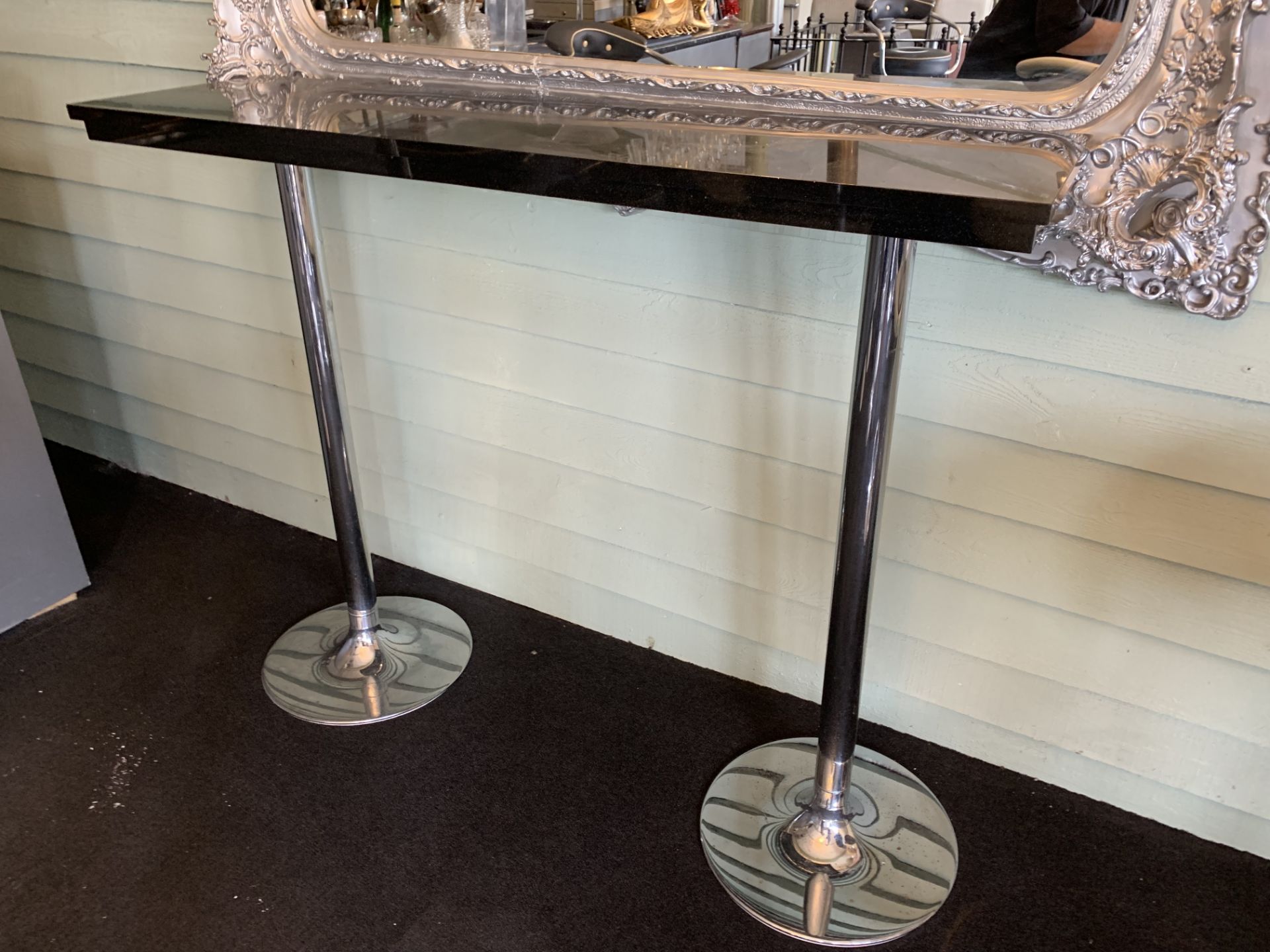 Black granite high bar table on twin chrome supports 137 x 37cm