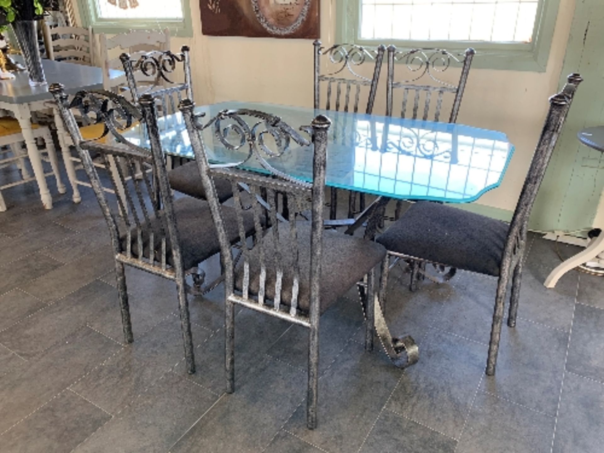 A gun metal grey metal framed rectangular dining table with shaped glass top 150 x 90cm complete