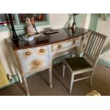 A mahogany topped bow front five drawer sideboard with grey and gilt painted decoration on tapered
