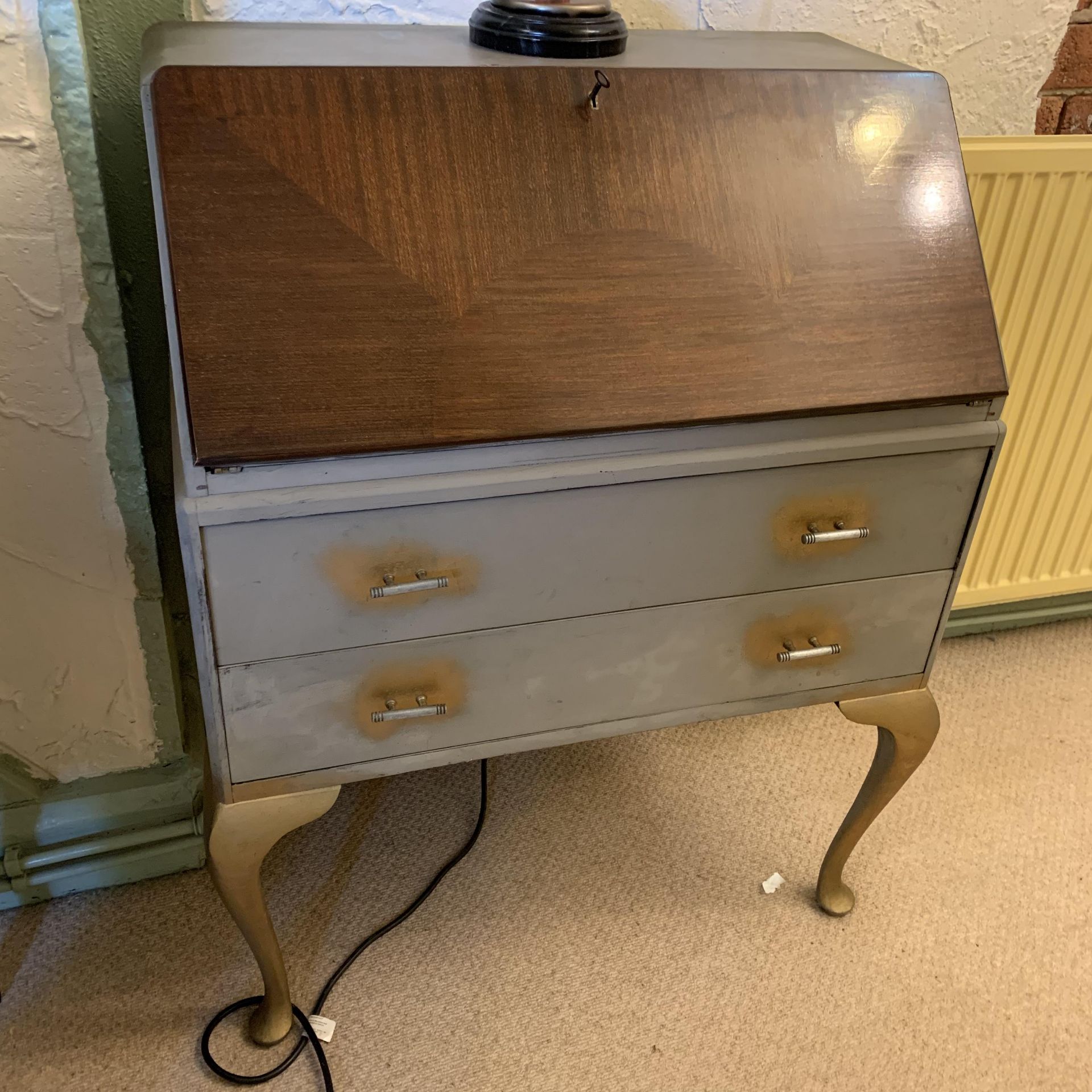 A mahogany and grey painted bureau with fall flap over two drawers on cabriole legs 75cm