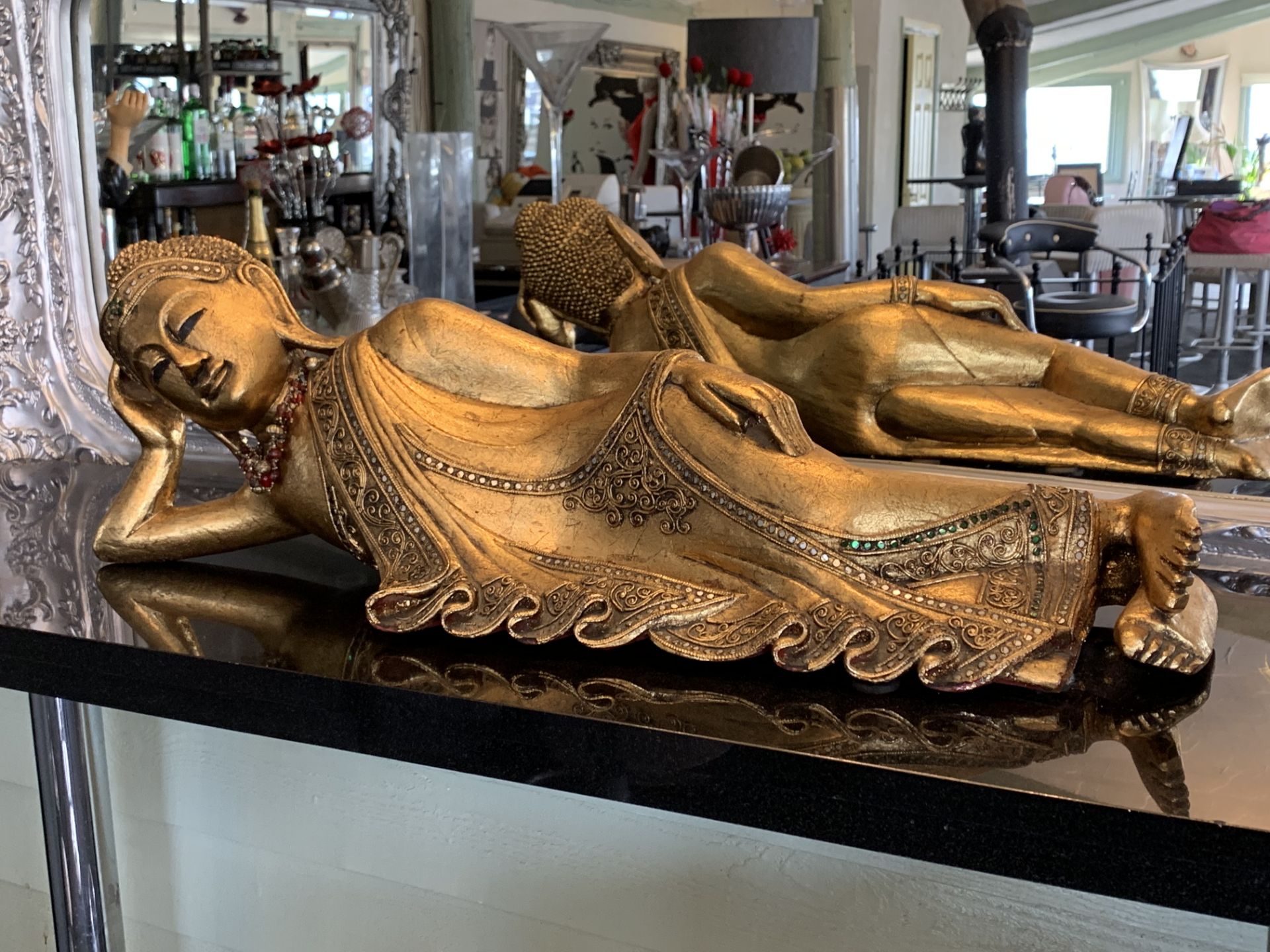 Gilt composite model of a reclining Buddha 75cm long