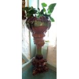 A brown and green glaze pottery jardiniere on pedestal 110cm high