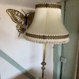 A brass standard lamp,