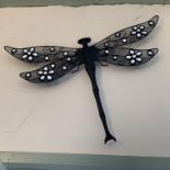 Wall mounting model of a flying insect