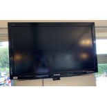 A Panasonic 36" DVB wall mounting flat screen TV complete with remote control and bracket