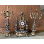 A gilt and grey marble finish clock garniture set