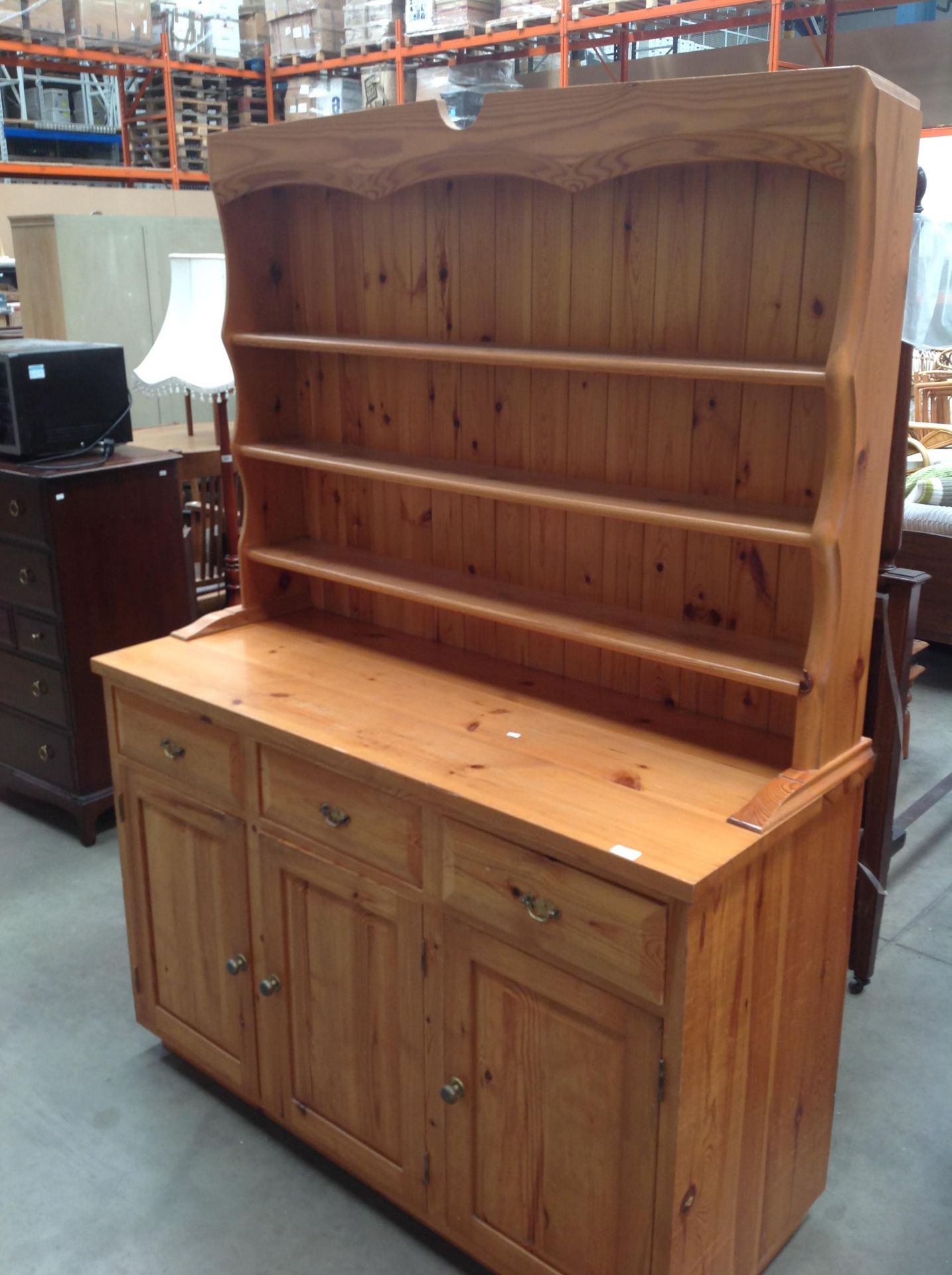 A pine three drawer three door dresser with 3 plate shelf top section 140 x 190cm high