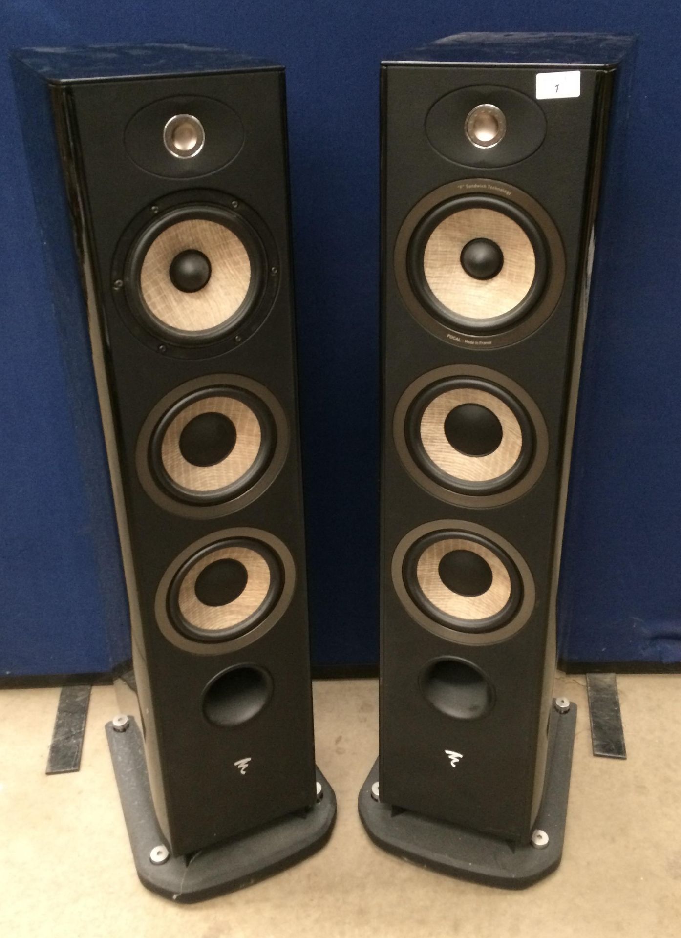 A pair of Focal Aria 926 80hms 250watts floor speakers in gloss black together with front grills