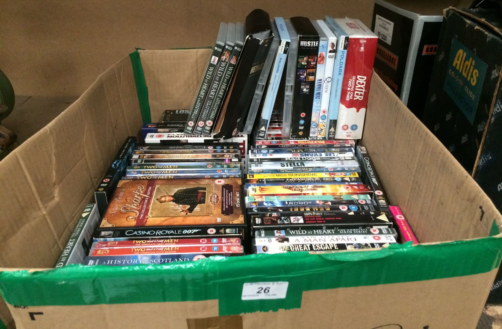 Seventy one assorted DVDs/DVD box sets -