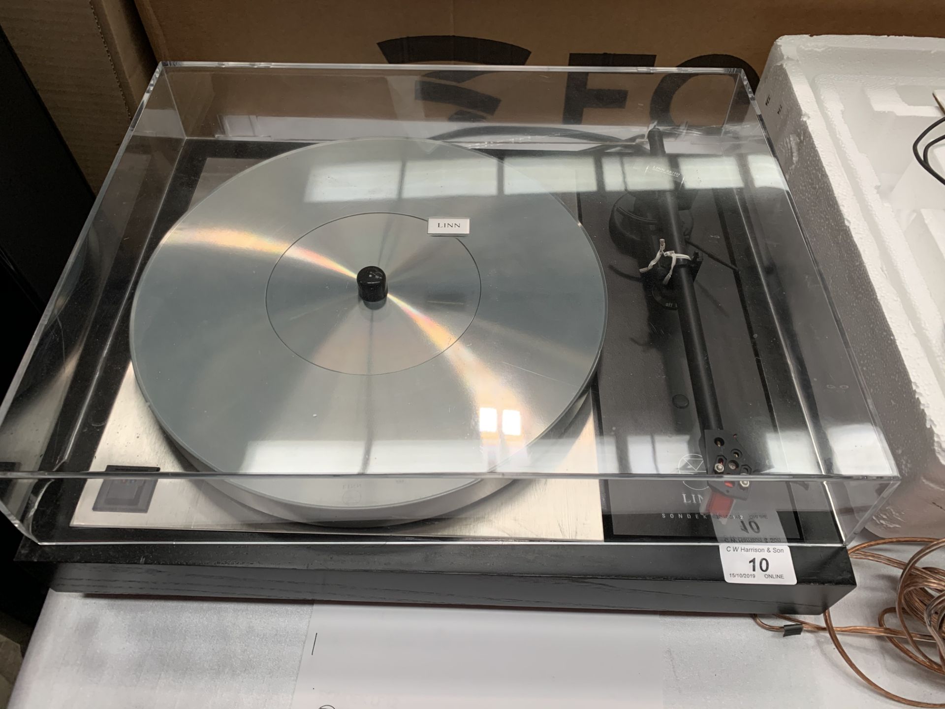 A Linn Sondek LP12 transcription turntable - manual (please note plastic dust cover damaged)