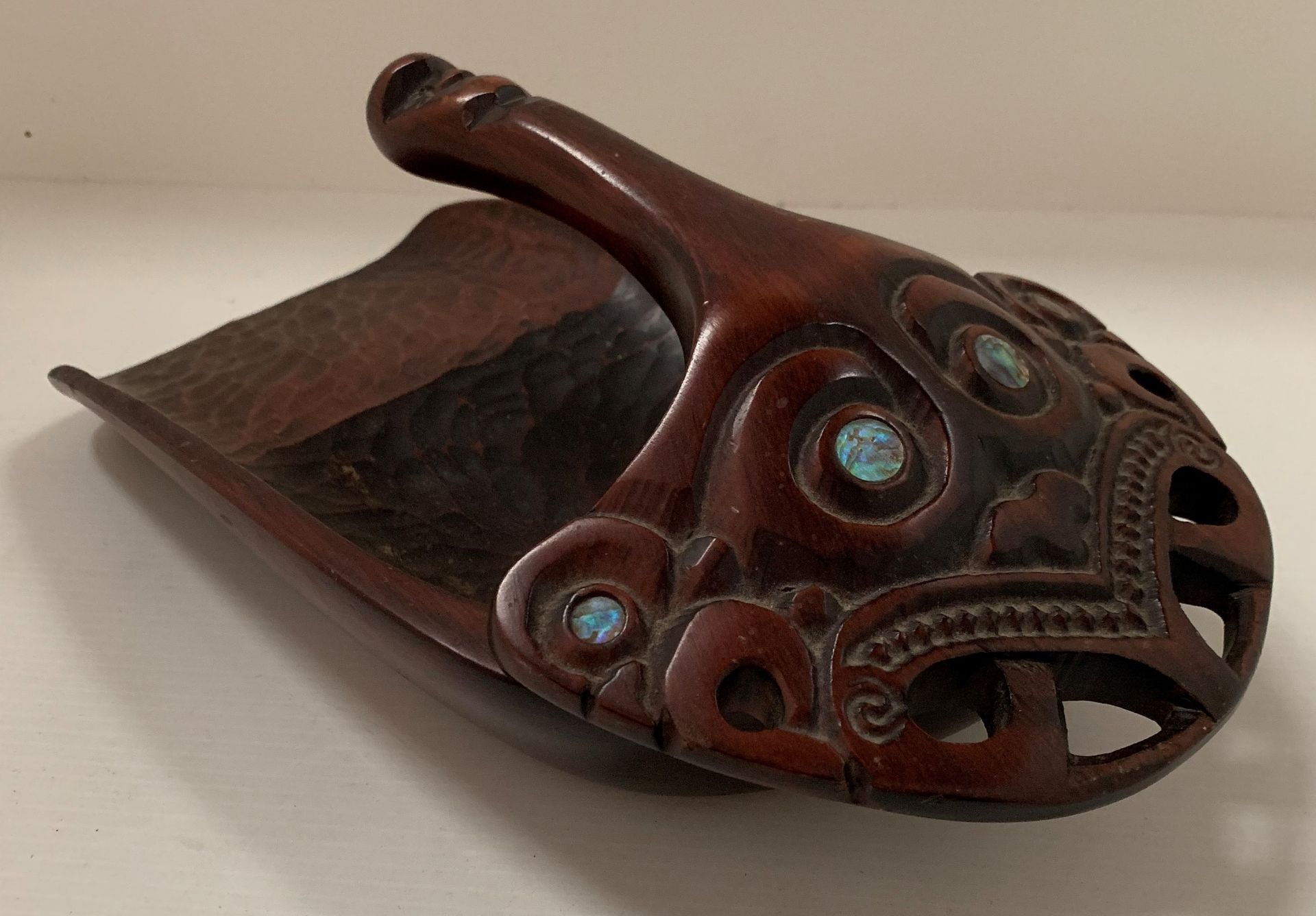 A New Zealand Maori hand carved Tiki bailer
