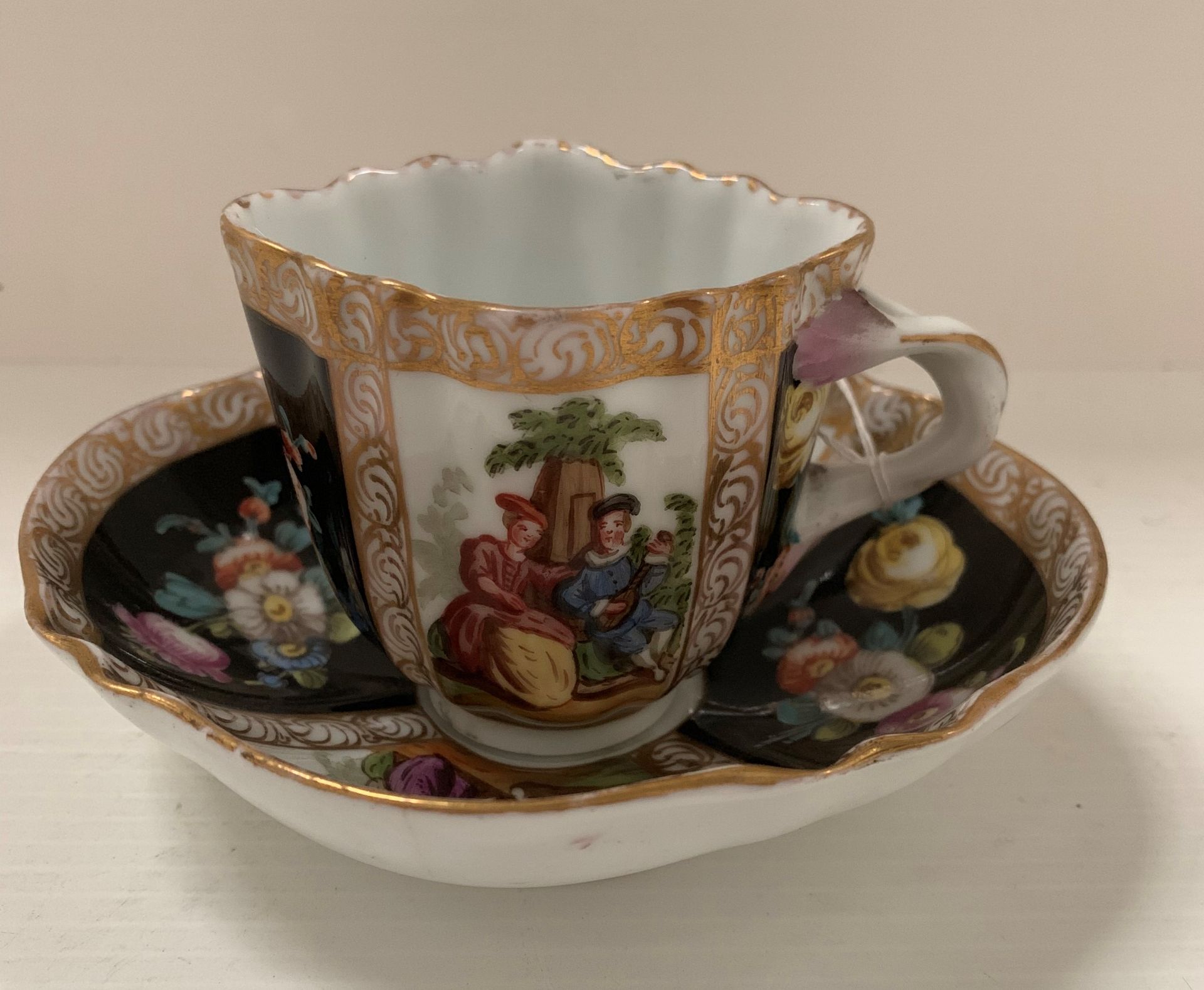 A Meissen-style quatrefoil cabinet cup and saucer,