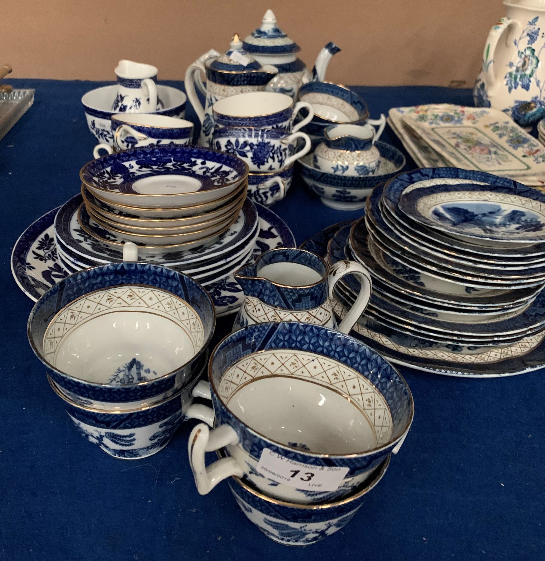 Two part blue and white tea services by Booths Real Old Willow pattern and Coalport