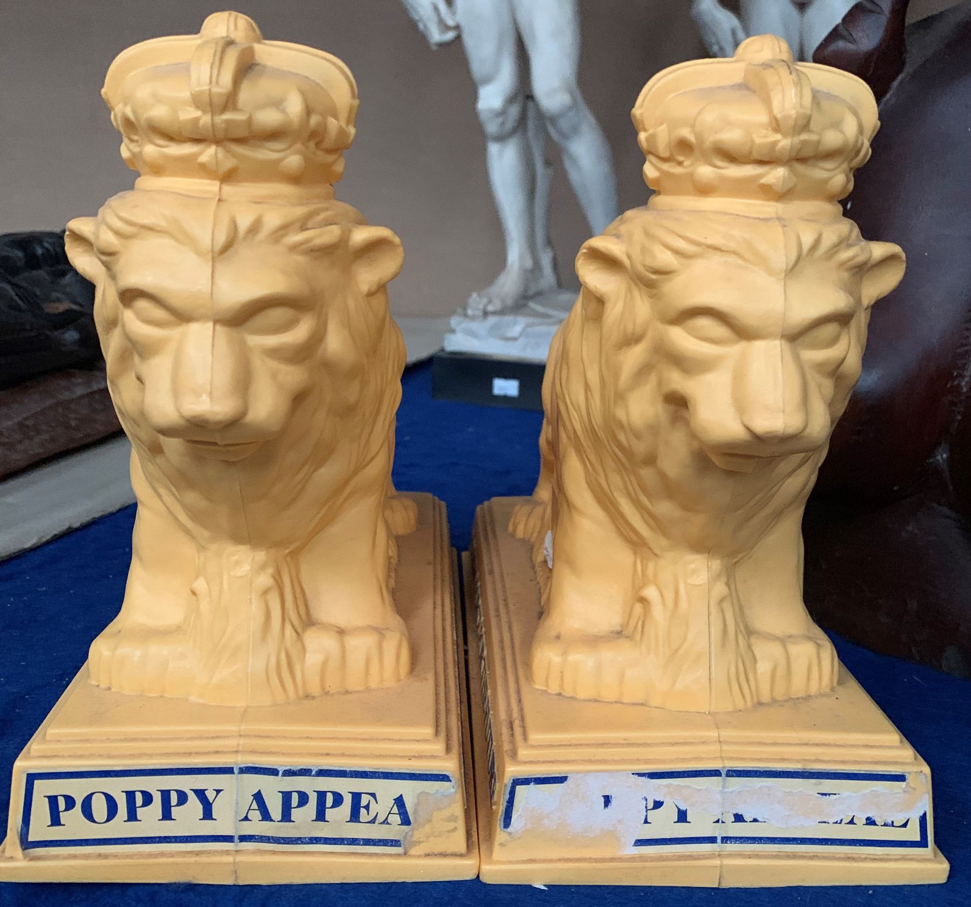 Two yellow plastic lion Poppy Appeal money boxes and a pair of wooden crutches - Image 2 of 2