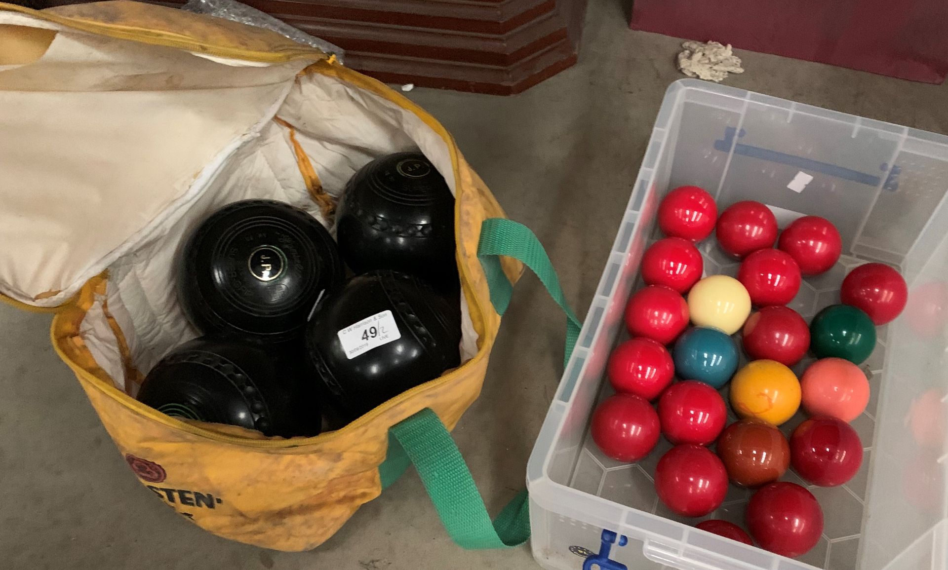 A set of four Hemselite Super grip bowls size 4 and a set of snooker balls (2)