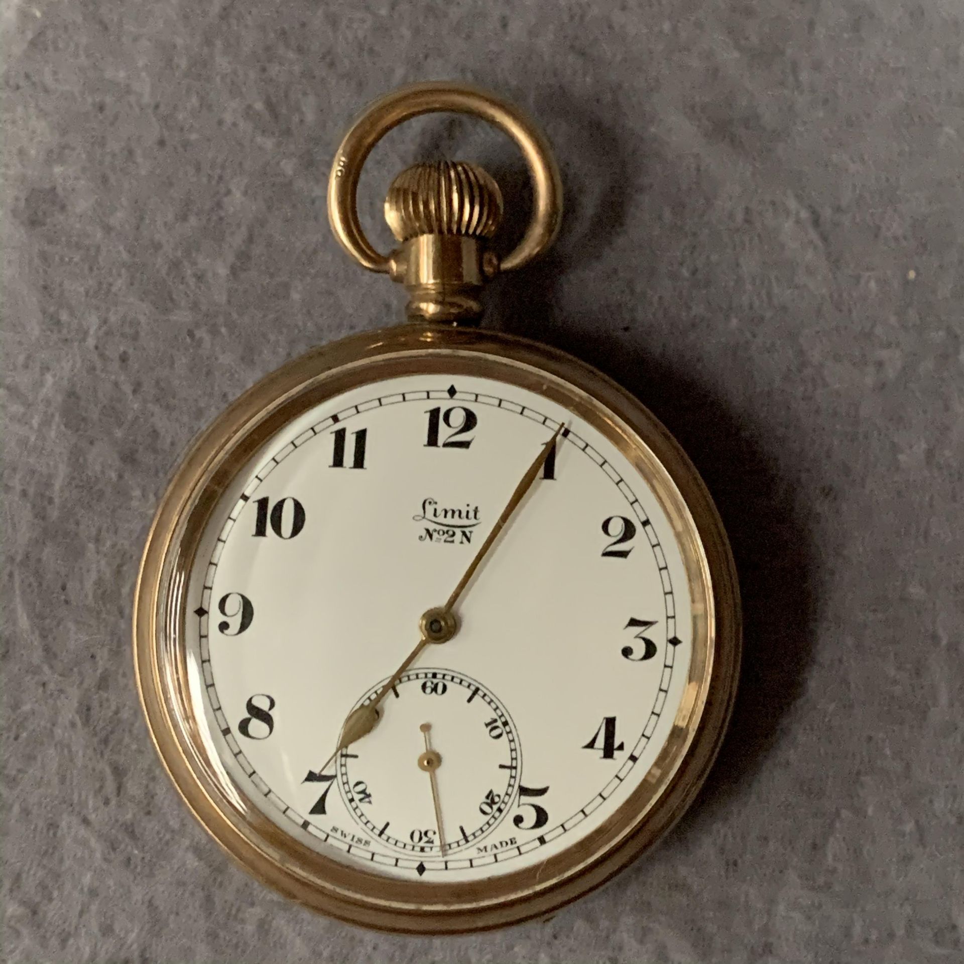 A 9ct gold cased open face gentleman's pocket watch with top winder and suspension loop - London