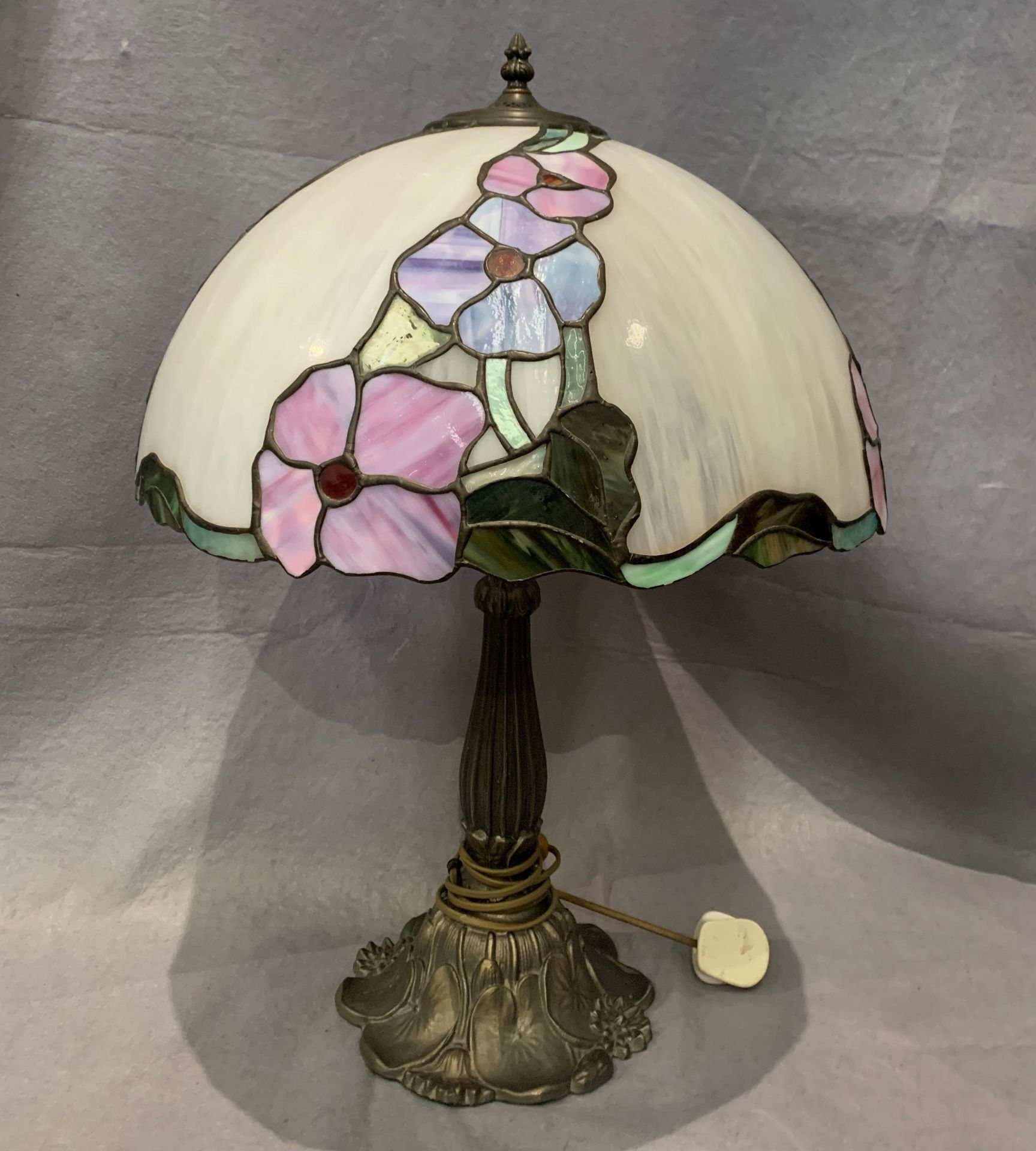 A reproduction Tiffany style table lamp and shade 67cm high