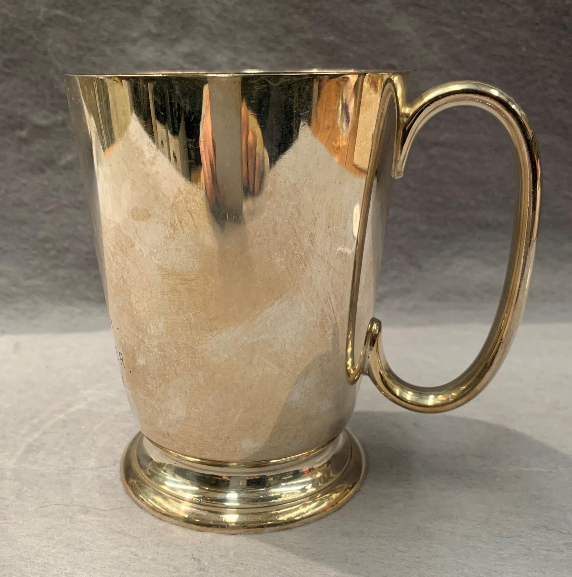 A silver plated presentation tankard dated 1924