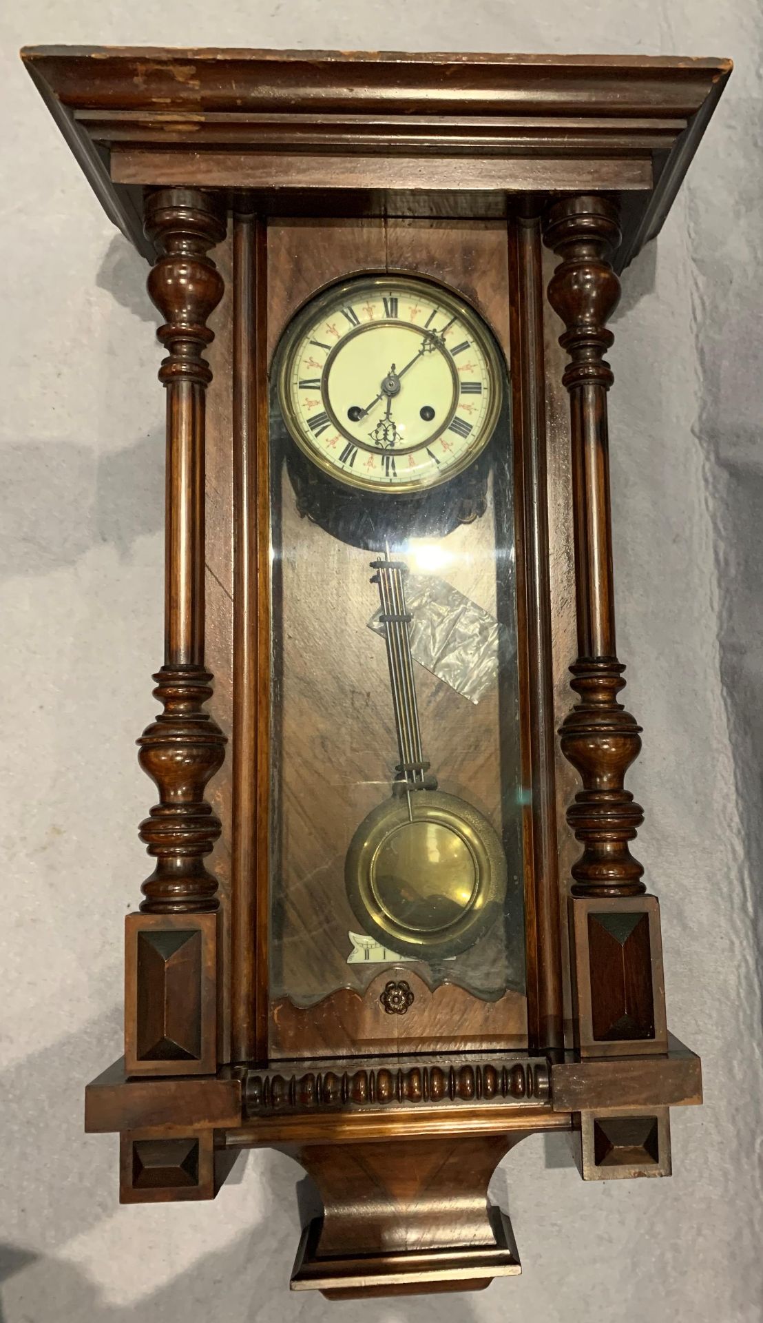 A walnut Vienna style wall clock 77cm long