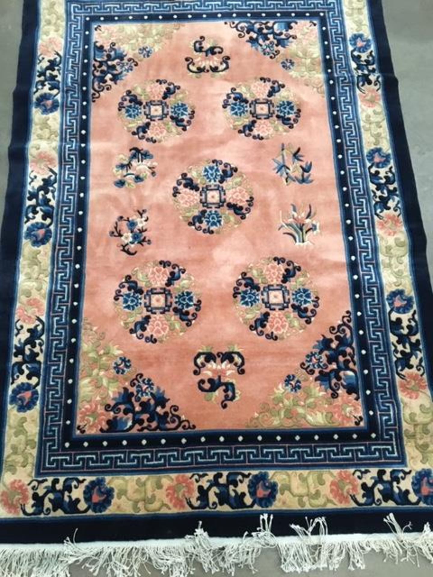 Oriental rug in pinks and blues 124 x 185cm