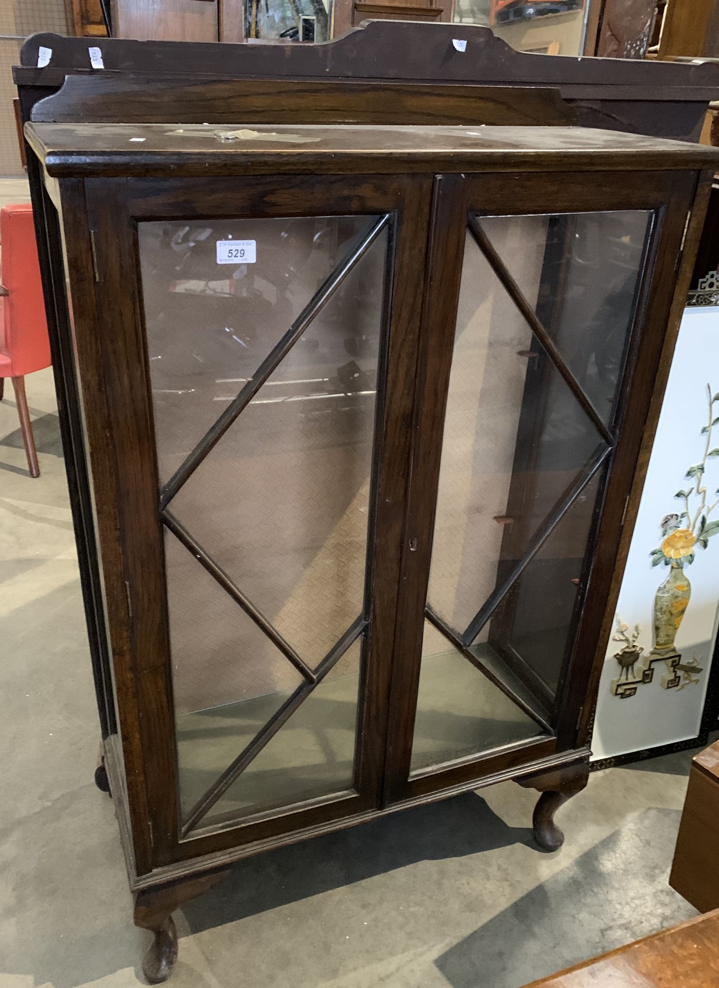 An oak two door display cabinet 73 x 115cm high complete with key