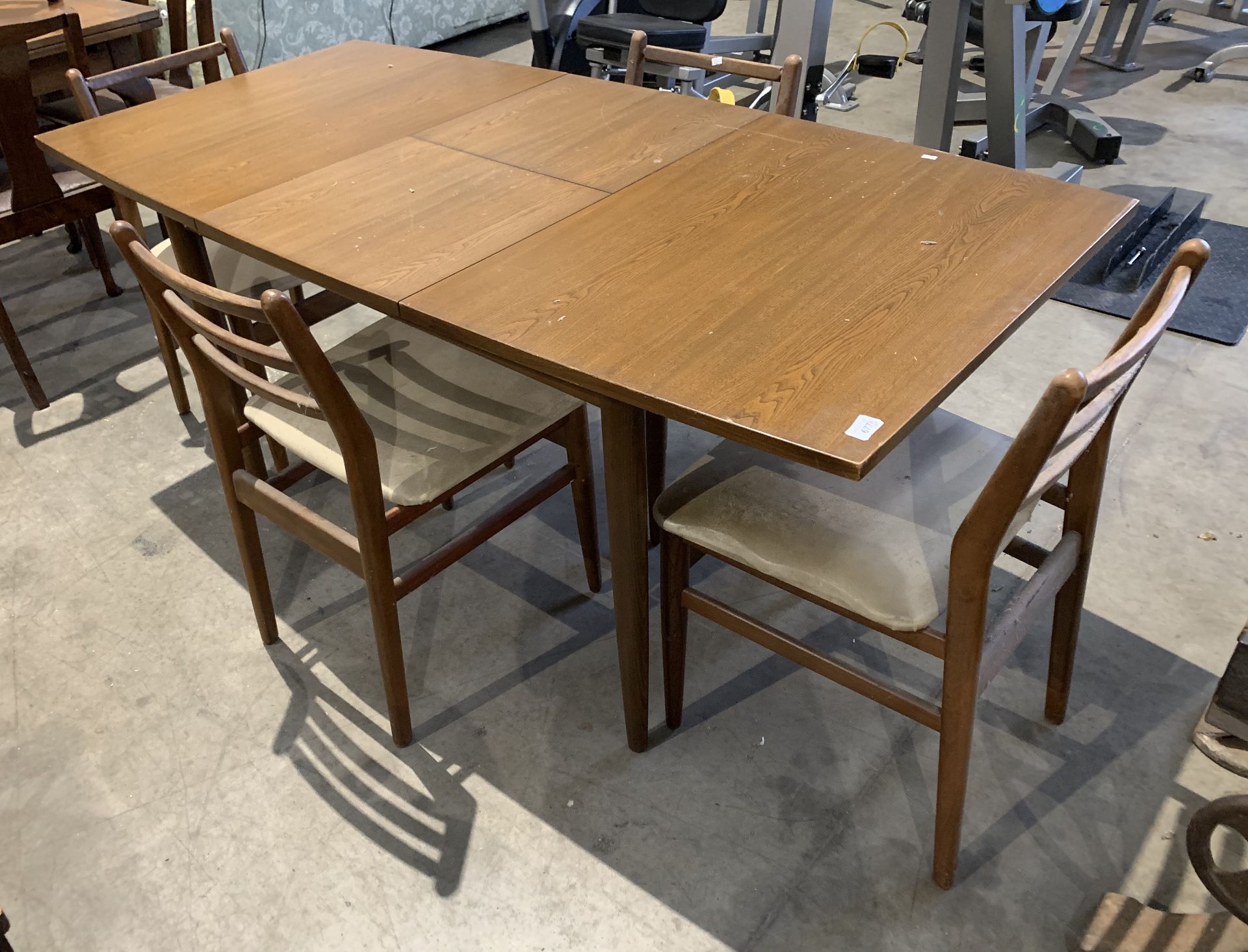 A Scandart Ltd High Wycombe Bucks five piece dining suite comprising extending dining table 75 x