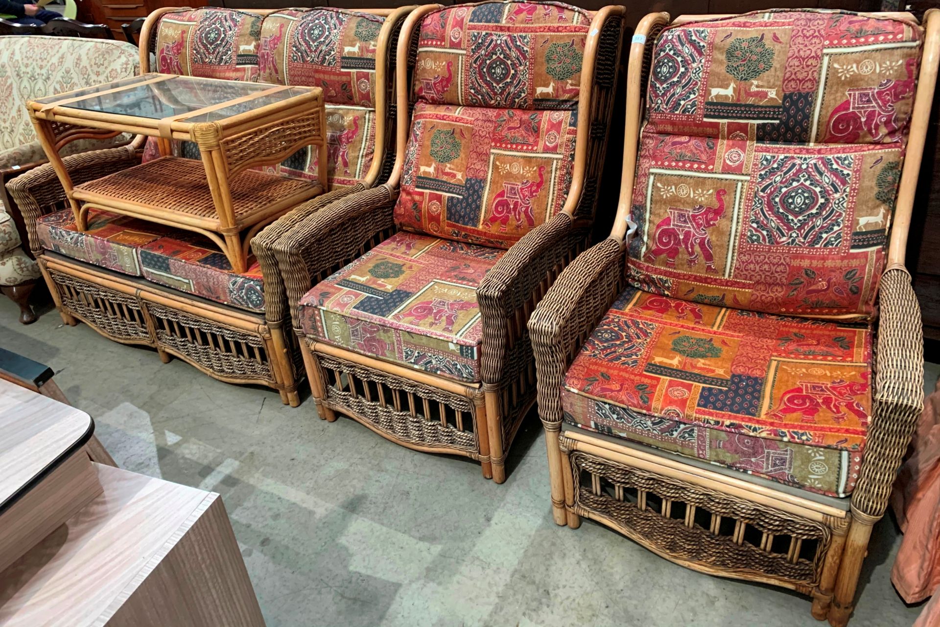 A bamboo framed four piece conservatory suite comprising two seater sofa,