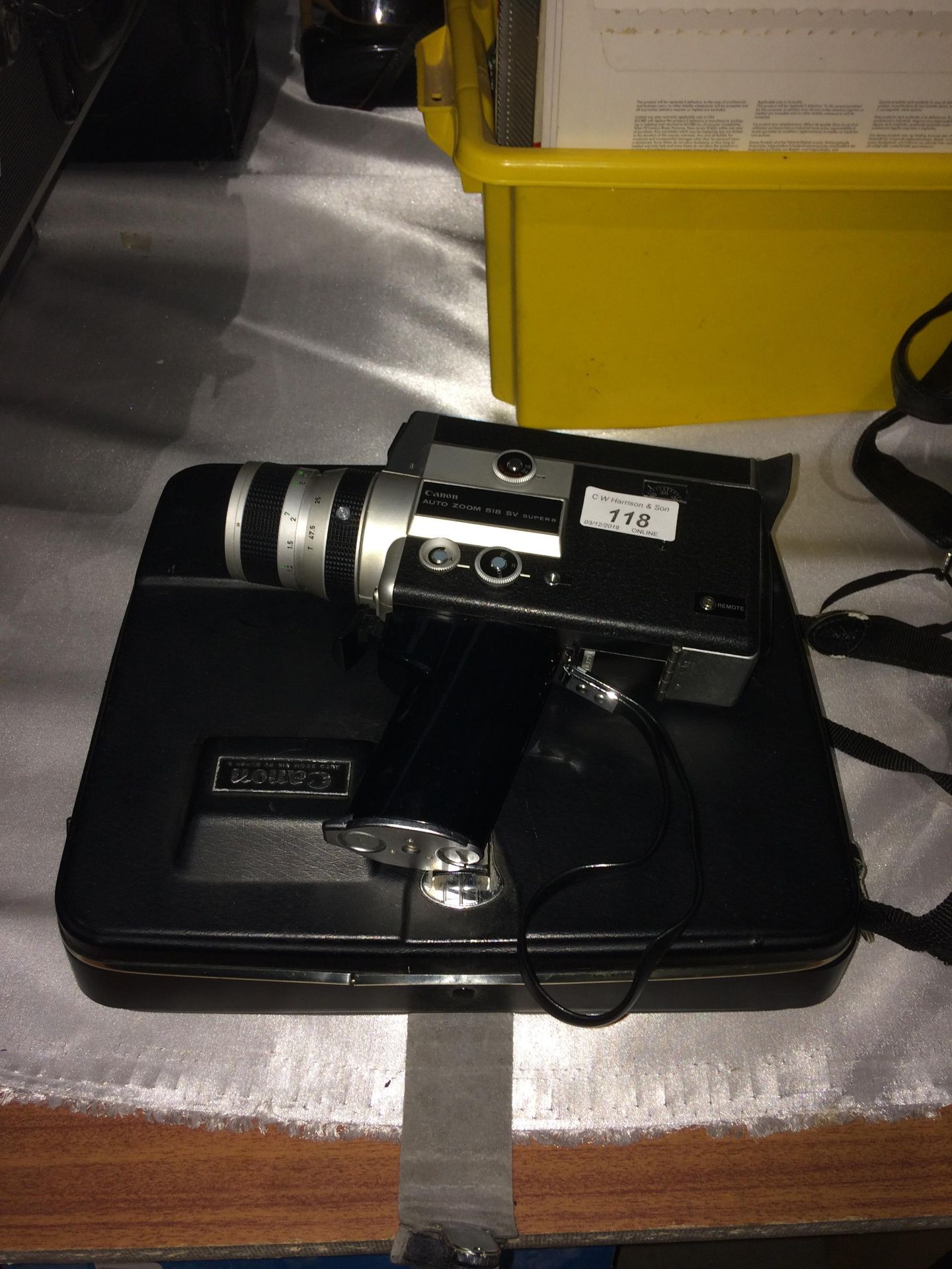 A Canon auto zoom 518 SV Super 8 camcorder in case