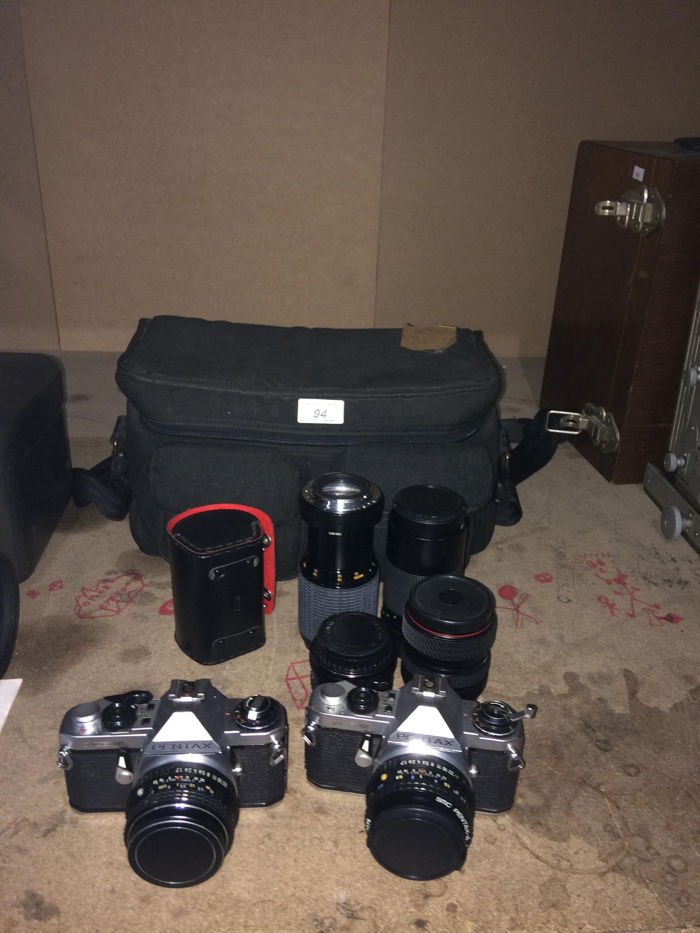 2 x Pentax ME Super cameras together with six lenses and a travel bag