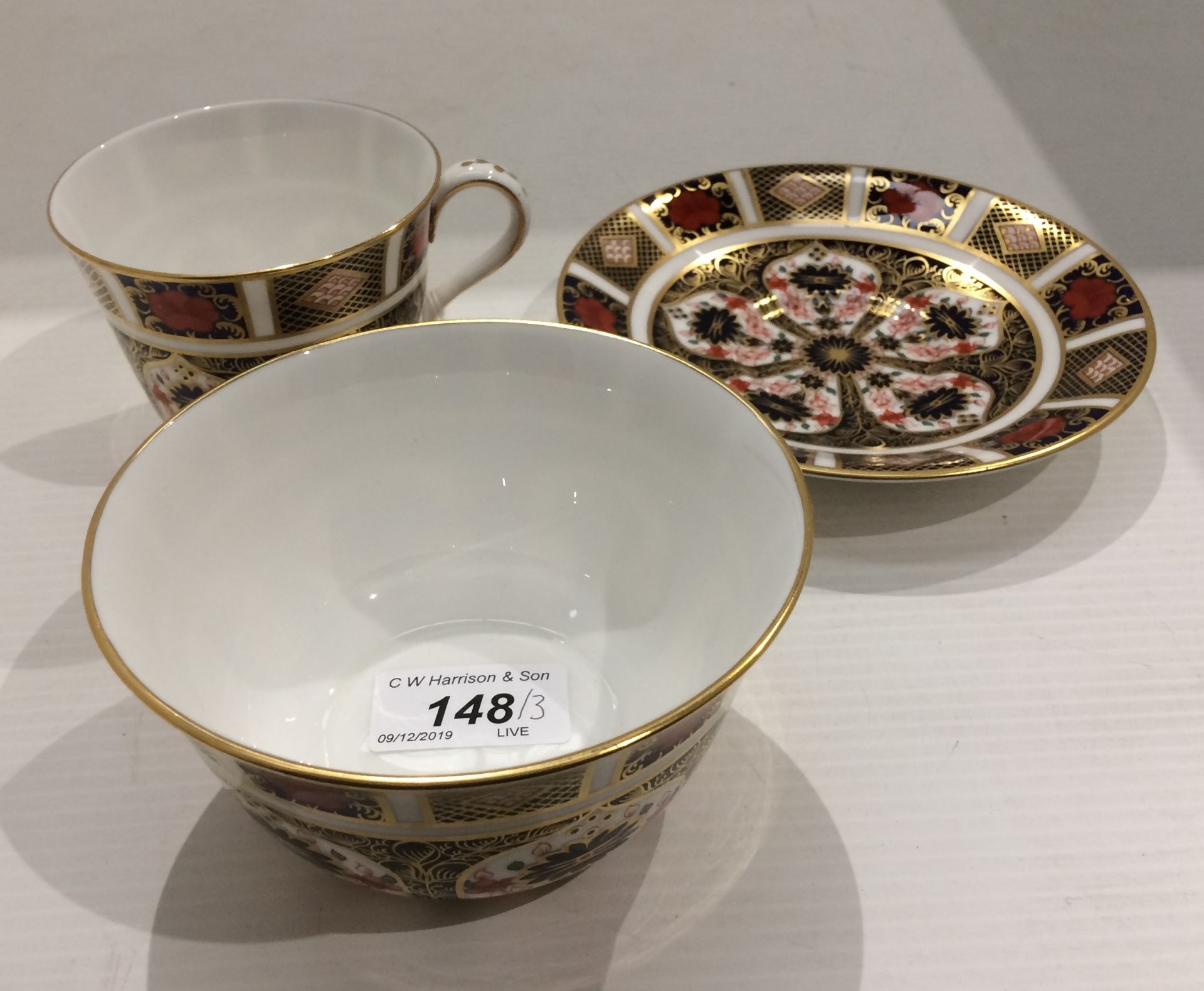 A Royal Crown Derby bone china Imari pattern bowl - 12cm diameter and a matching cup and saucer