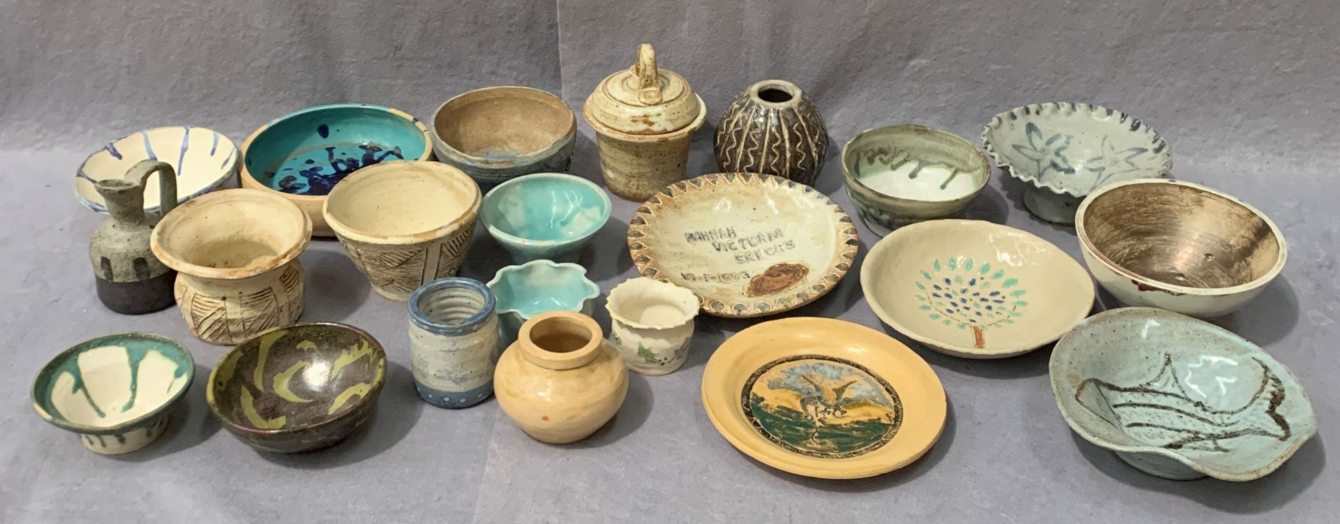 JOAN UNDERHILL - 25 mainly smaller glazed studio pottery plates, dishes, bowls,