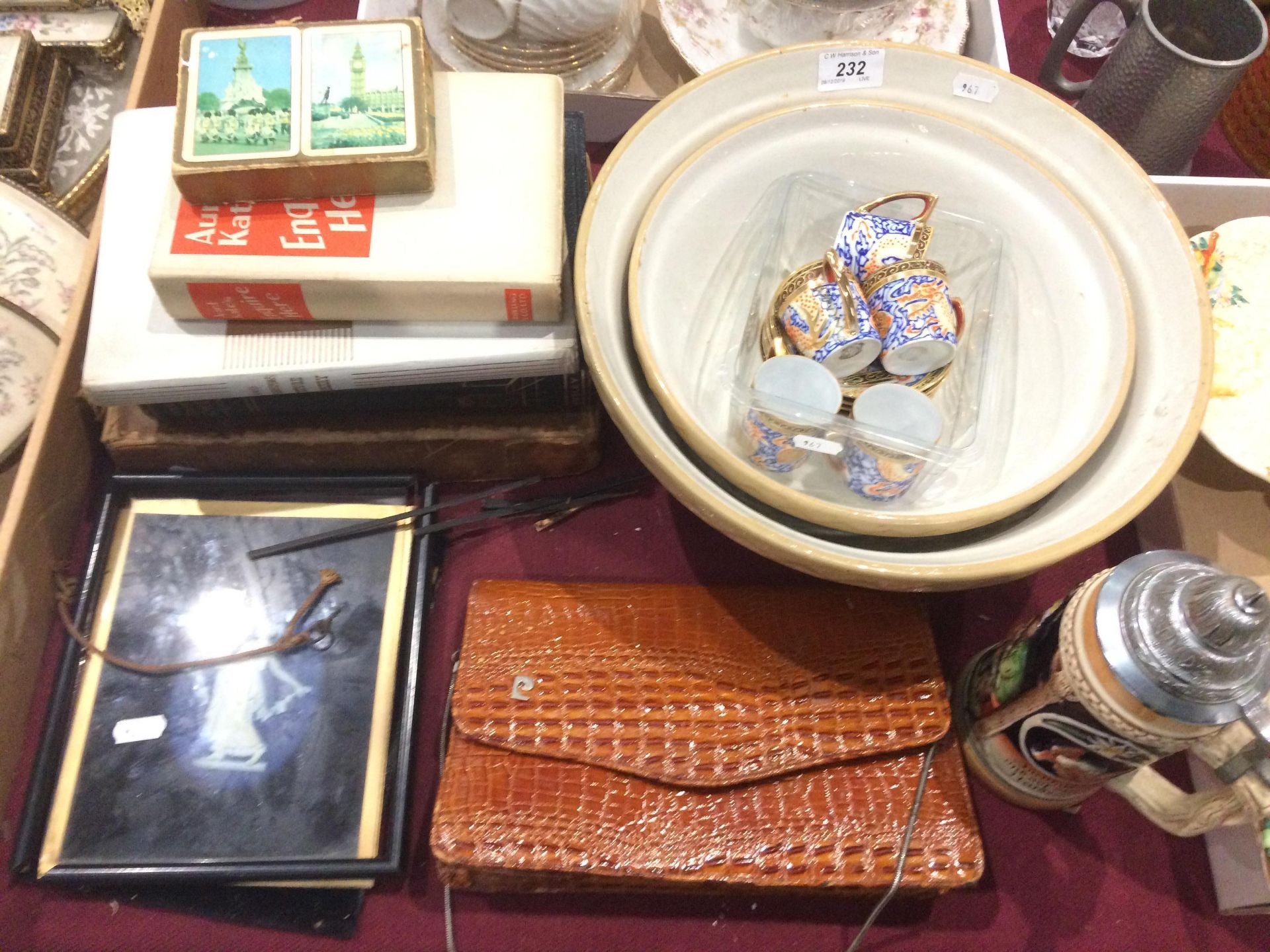 Two mixing bowls, book, handbag,