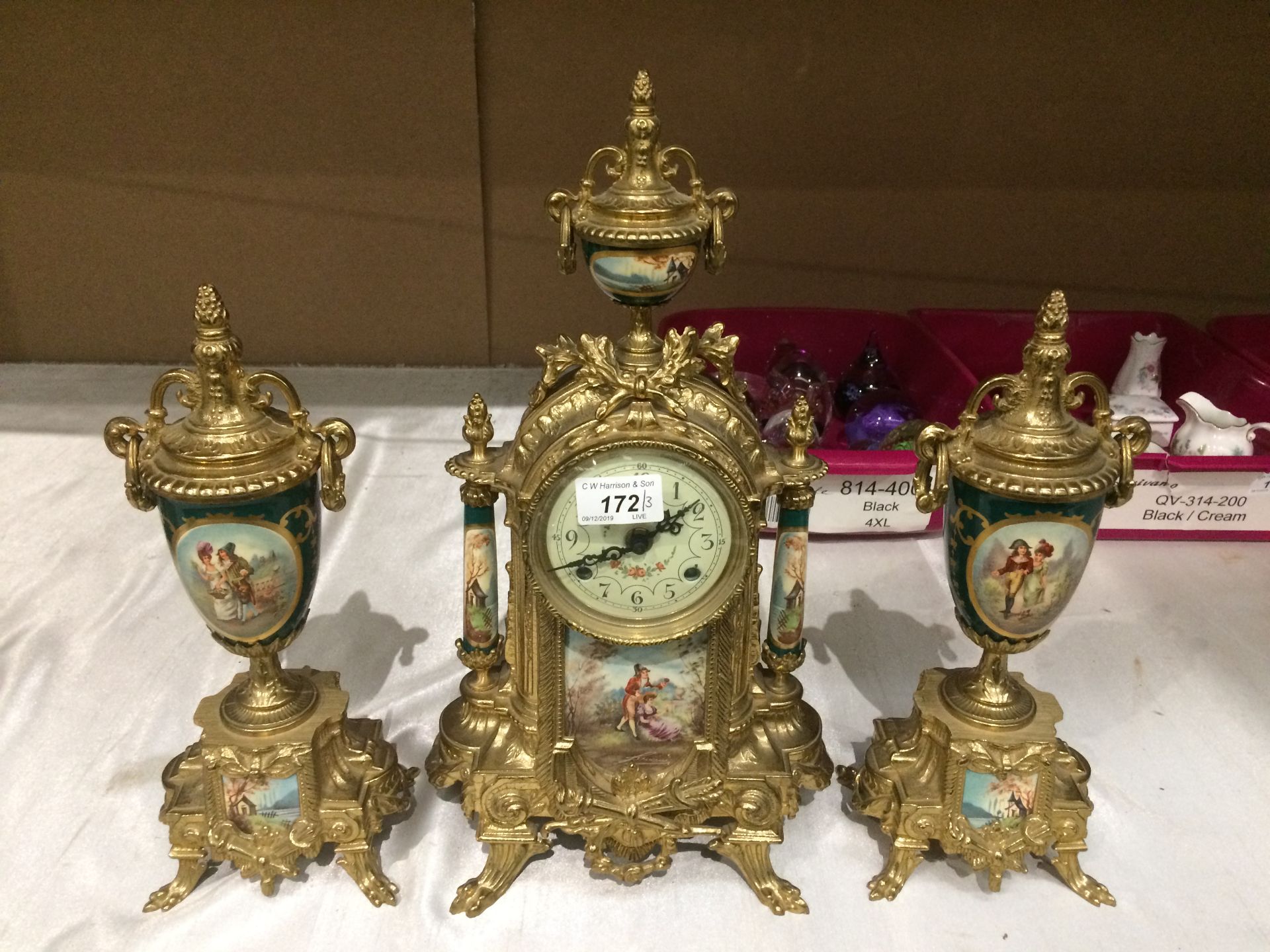 A reproduction Continental style gilt finish clock garniture set,