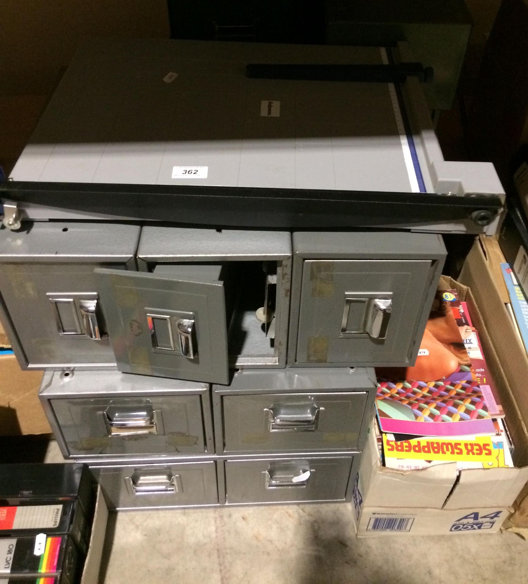 Approximately eleven items - Fellowes paper guillotine and ten green and grey metal index cabinets