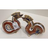 Two Royal Crown Derby bone china Dragon paperweights 12cm high (2)