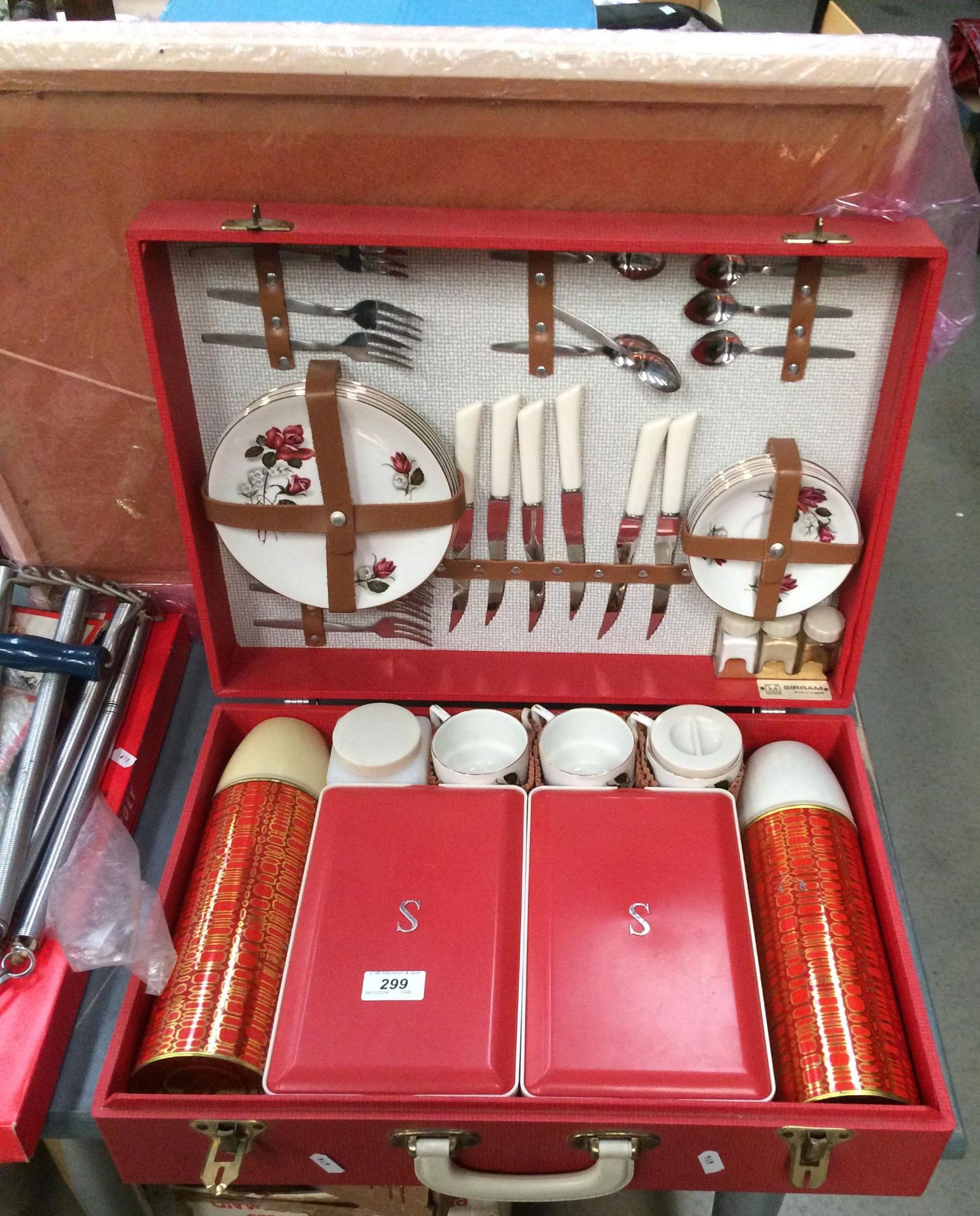 A Hawker Morris Sirram picnic set in red checked vinyl case (hardly used), chest expander,