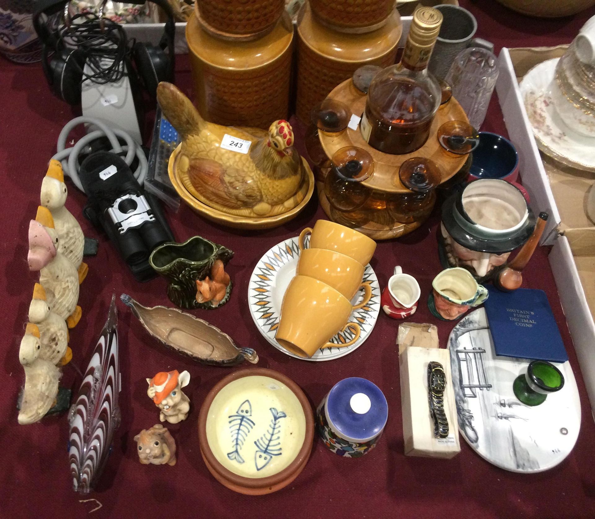 Contents to table top - Sennheiser headphones, Hornsea pottery jars, Toby jugs,