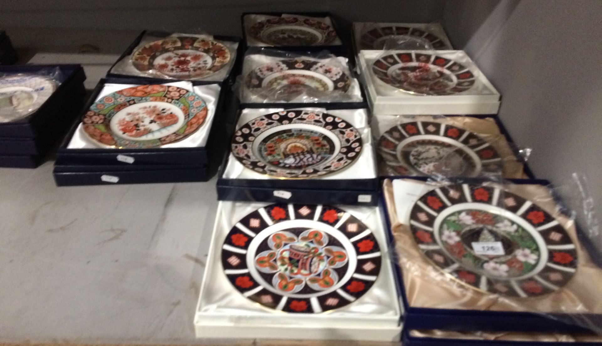 Thirteen boxed Royal Crown Derby bone china limited edition Christmas plates each 22cm diameter -