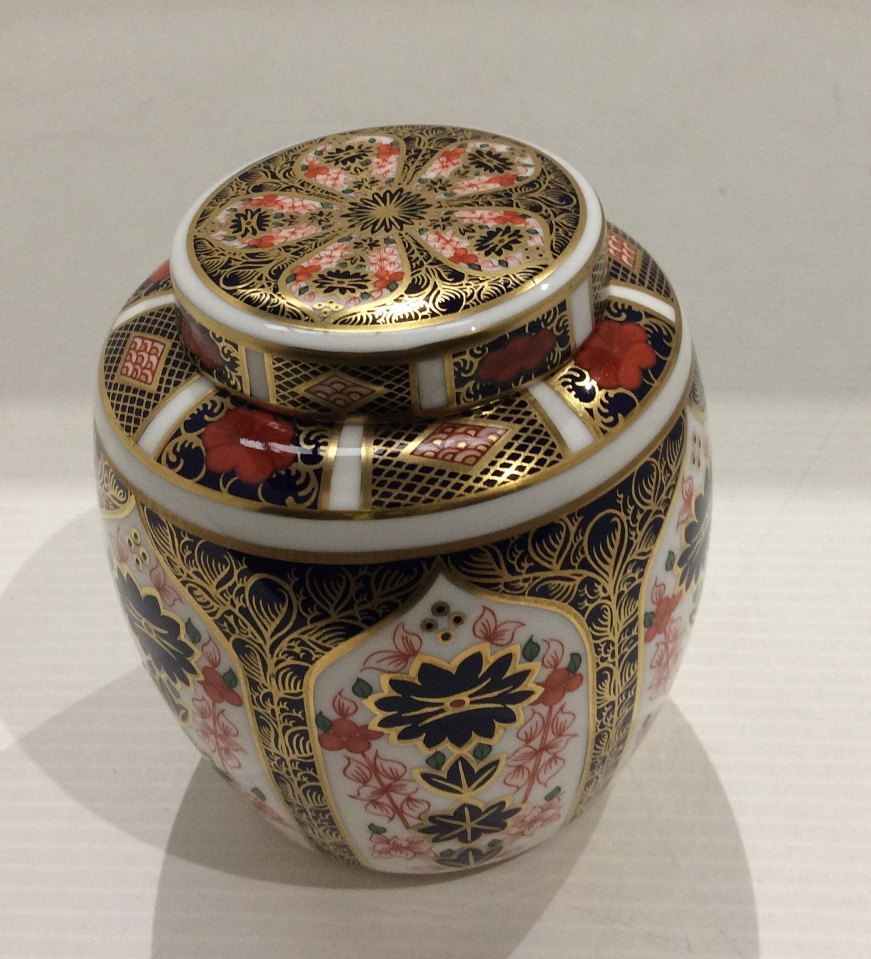 A Royal Crown Derby bone china Old Imari pattern jar with cover - 12cm high