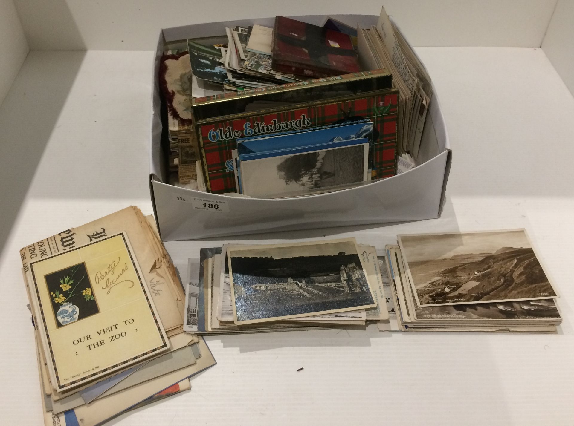 A box of mixed postcards