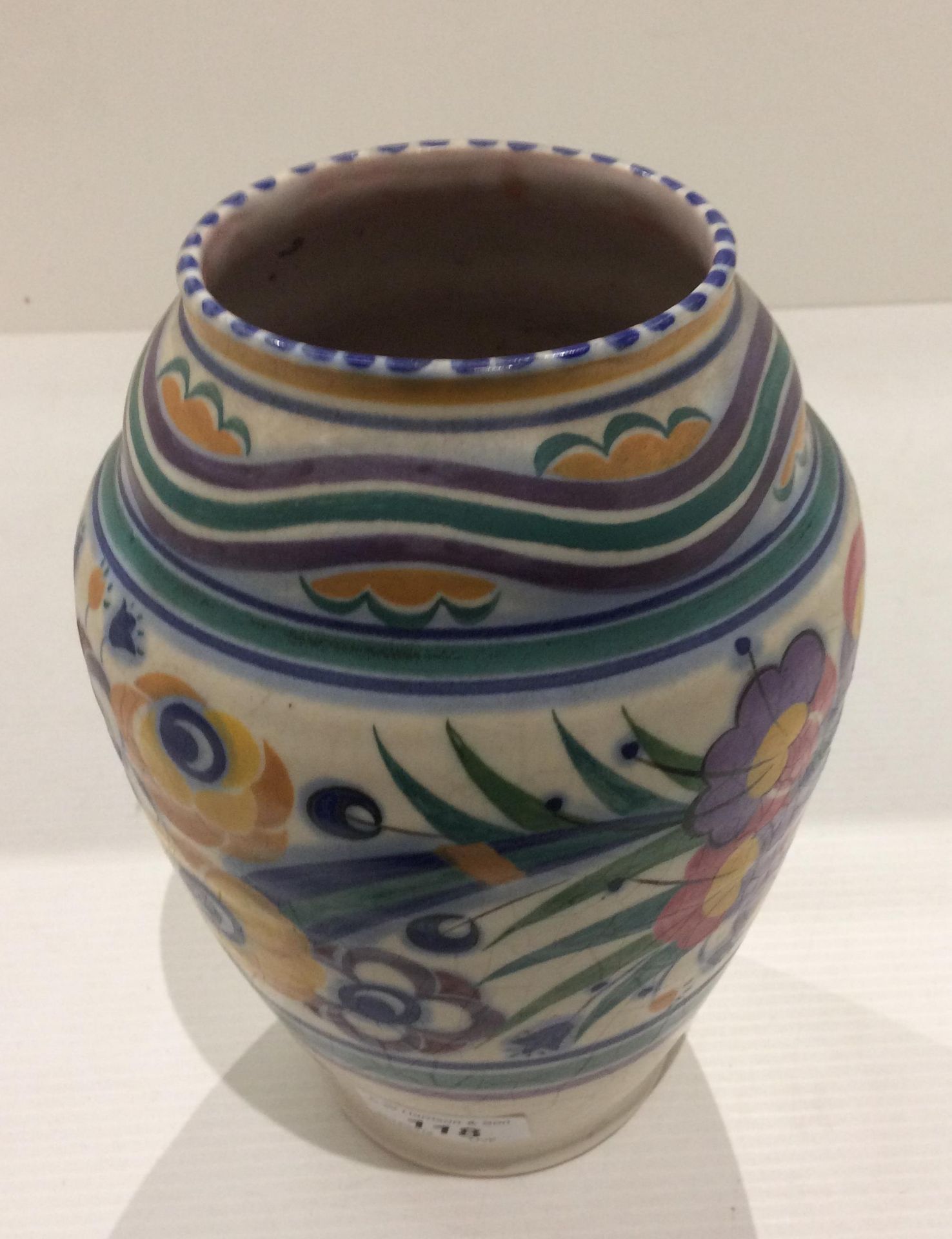 A Poole Pottery vase reg. no. 599 - 22.