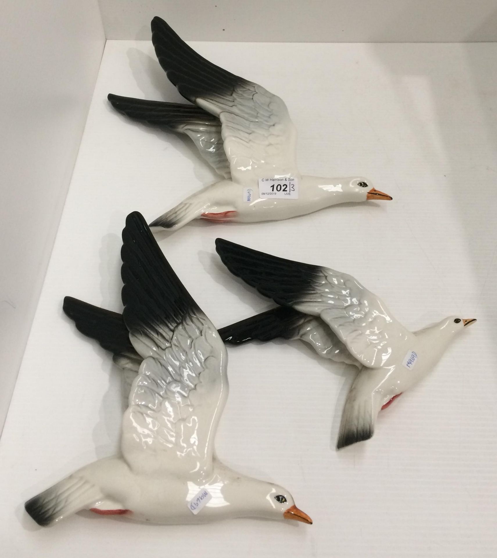 A set of three Beswick graduated wall mounting pottery seagulls no's 922-1,