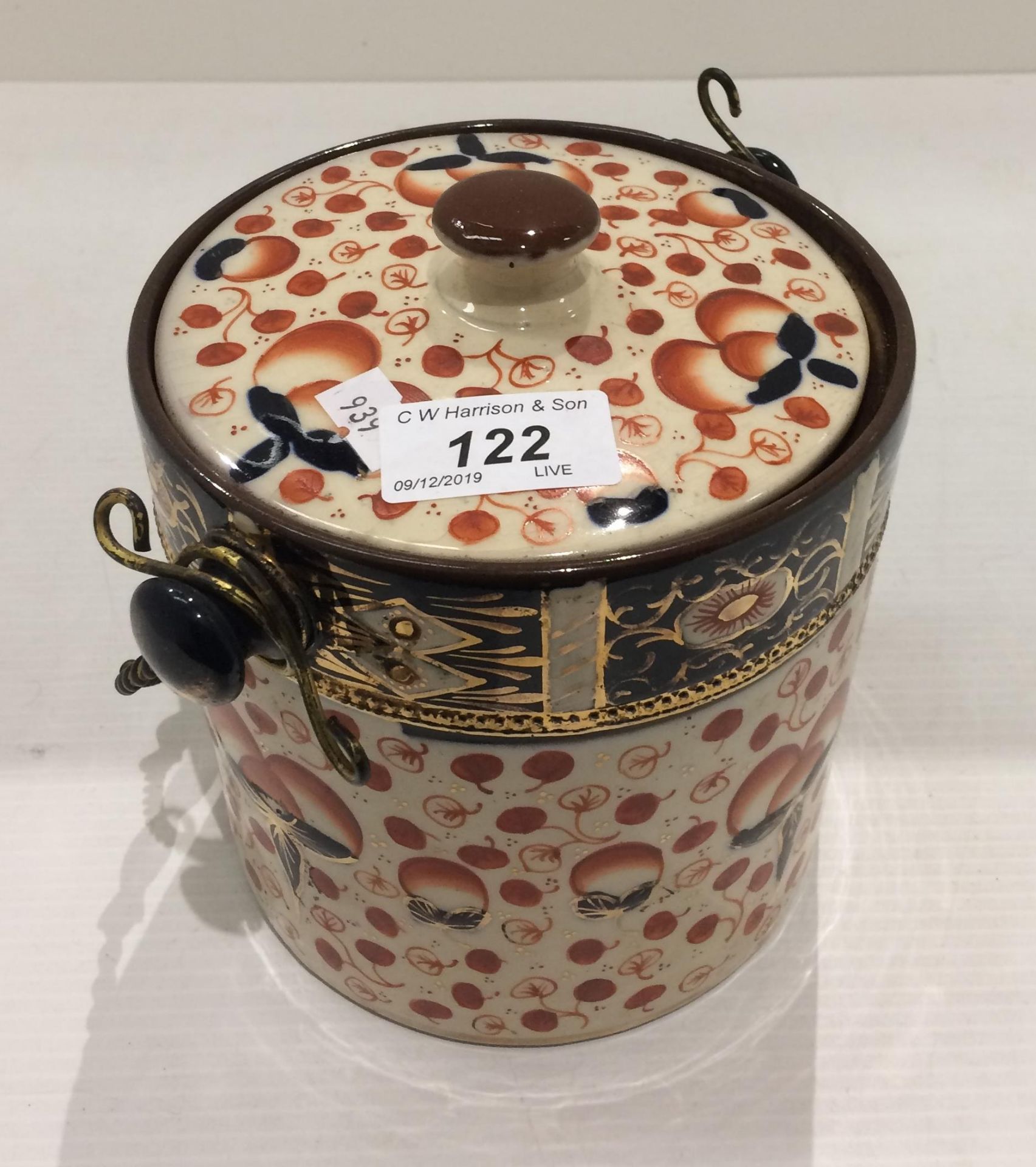 A pottery biscuit barrel with lid in the style of Crown Derby - 16cm high