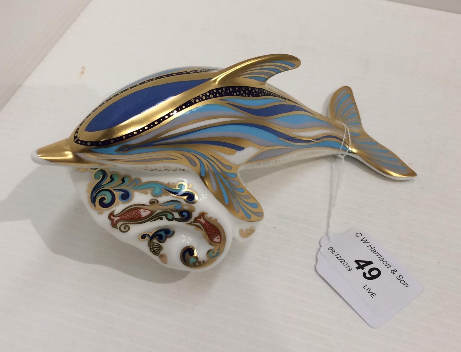 A Royal Crown Derby bone china P/W Striped Dolphin paperweight - 18cm long,