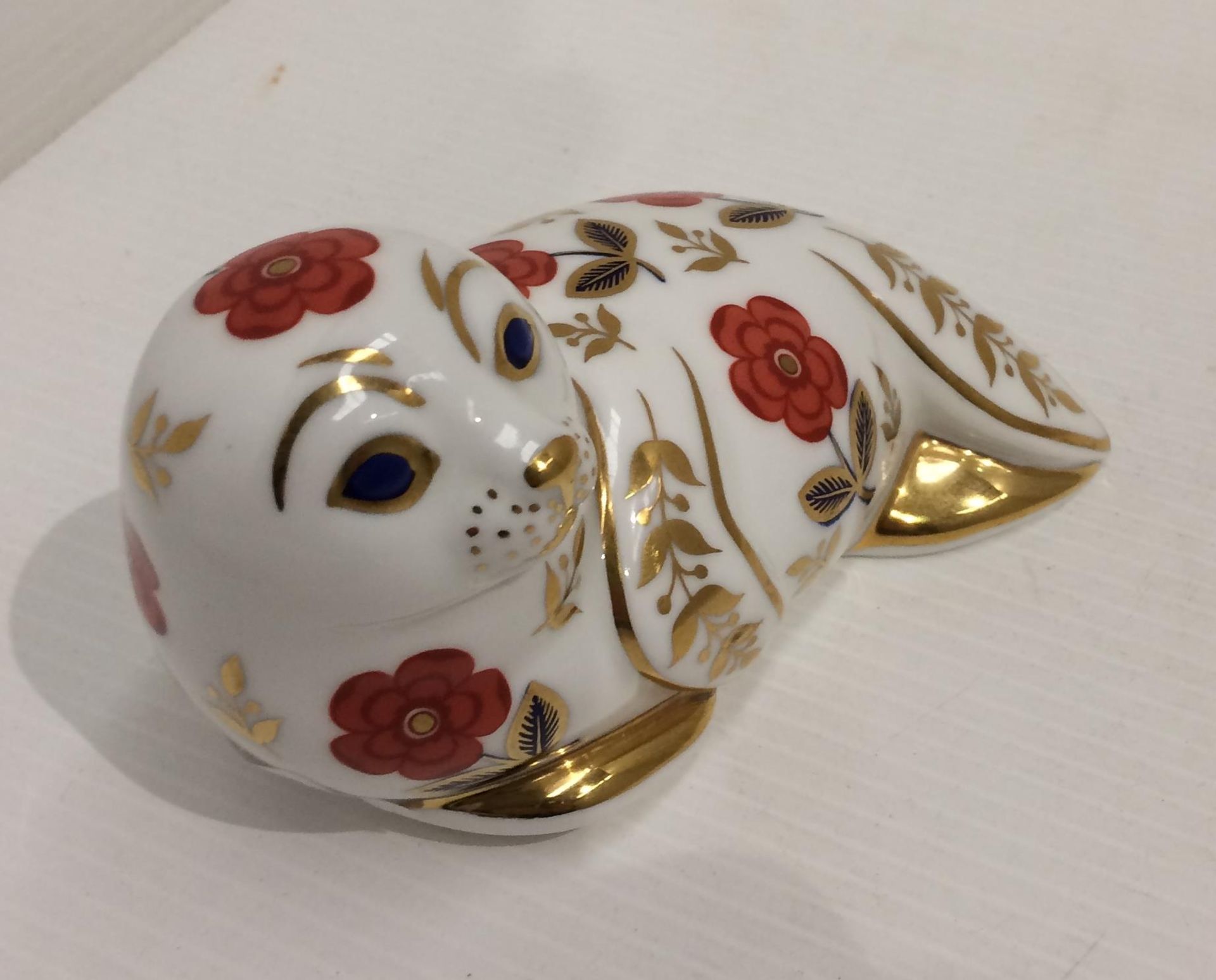 A Royal Crown Derby bone china Seal paperweight - 13cm long