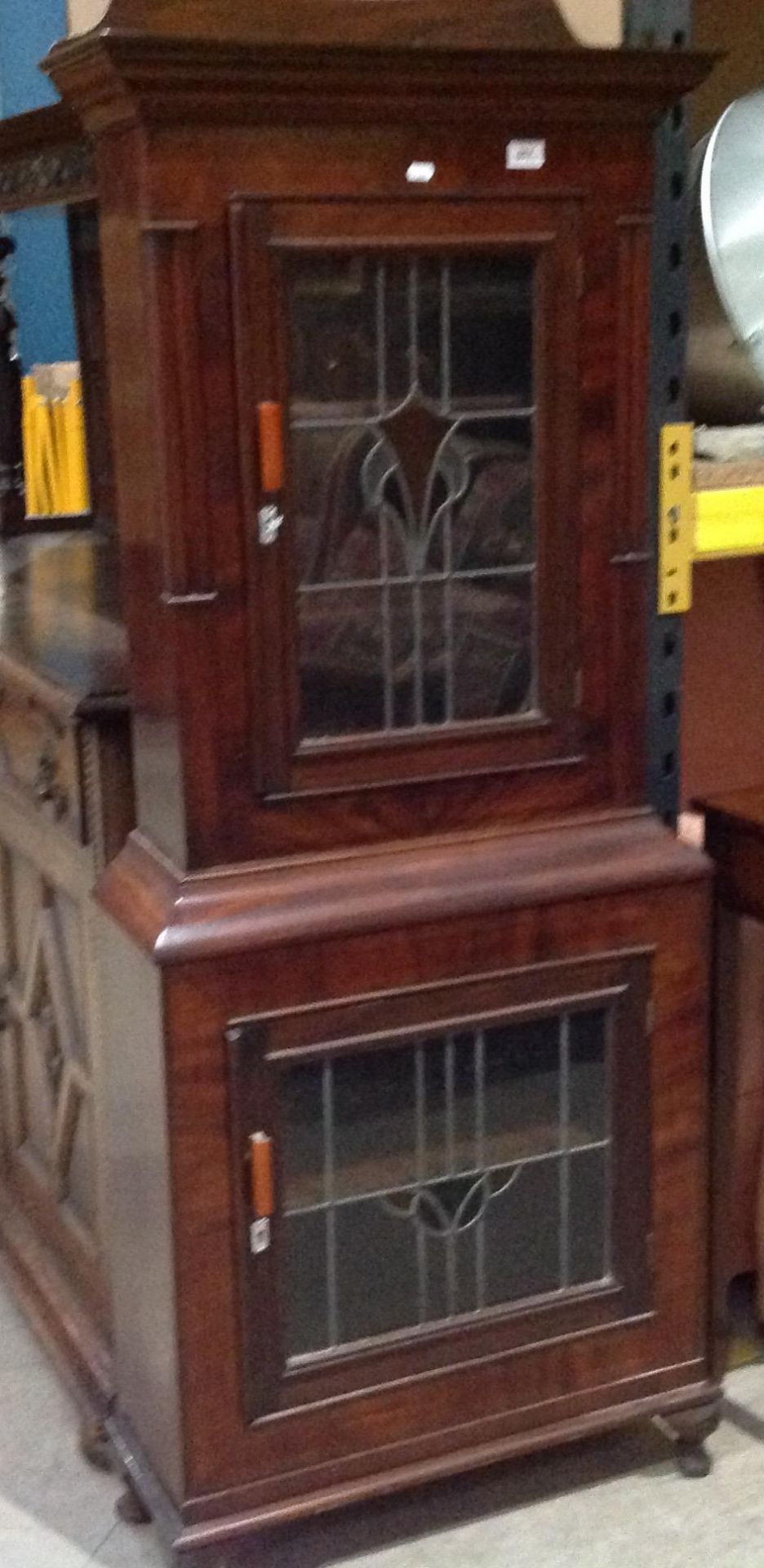 A mahogany 2 door wall unit with Art Nouveau style leaded glazed doors 64 x 168cm high