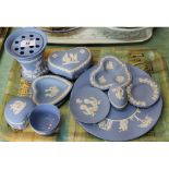 A quantity of Wedgwood Jasperware to include trinket boxes, vase, pin dishes,