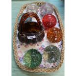 Seven bubble glass paperweights plus a Murano gold flecked basket