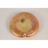 A Ditchfield Glasform orange iridescent paperweight with frog mount