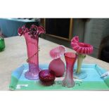 Four pieces of cranberry glass plus a Burmese frill neck vase